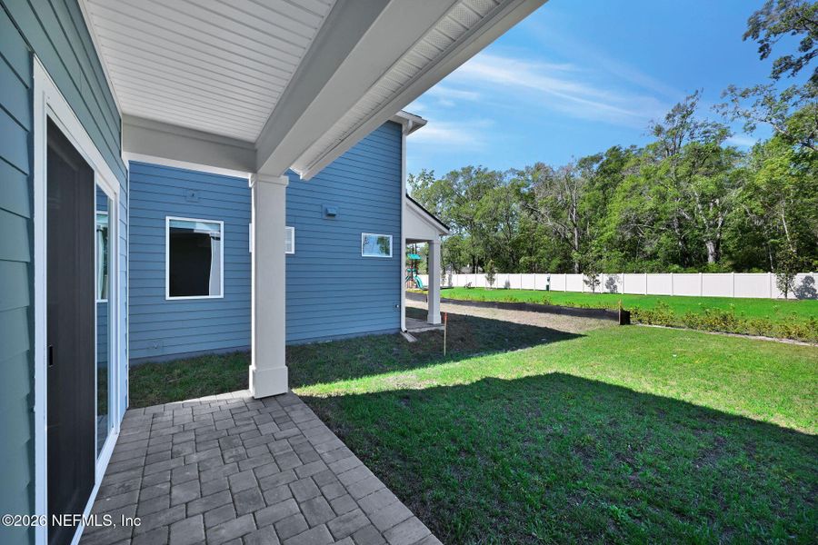Exterior details and patio area of a home in Baxley Villas, Middleburg (Image 18).