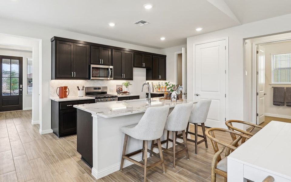 Representative furnished interior of a home built from the Reed by Brookfield Residential in Traditional at Kissing Tree, San Marcos (Image 13). Representative furnished interior of a home built from the Reed by Brookfield Residential in Traditional at Kissing Tree, San Marcos (Image 13).