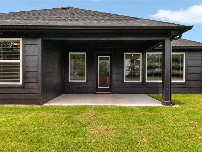 Exterior details and patio area of a home in Hadley Farms, Godley (Image 27).