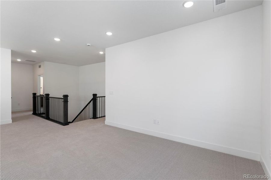 Spacious, unfurnished interior of a new home in Dillon Pointe - Journey, Broomfield (Image 20).