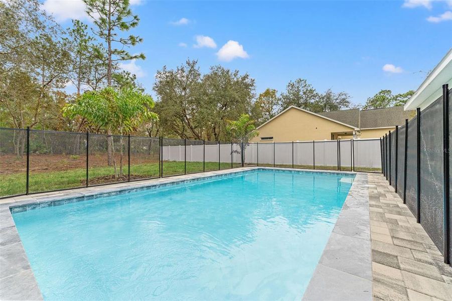 Exterior details and patio area of a home in , Brooksville (Image 40). Exterior details and patio area of a home in , Brooksville (Image 40).