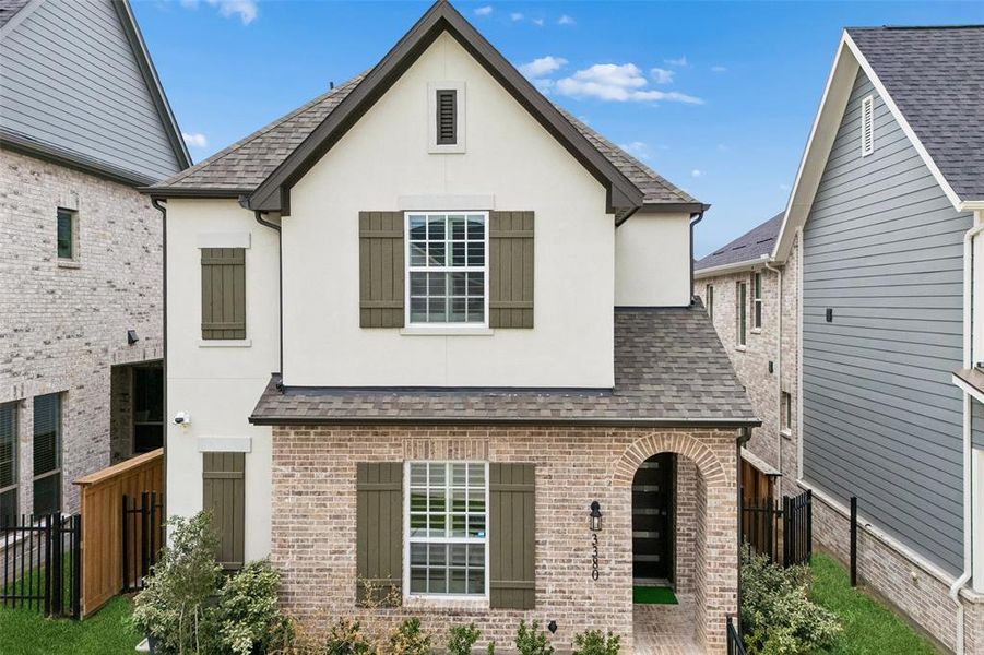 Front exterior of a new home in Fields Villas - Darling Homes, Frisco, TX, highlighting curb appeal (Image 22).