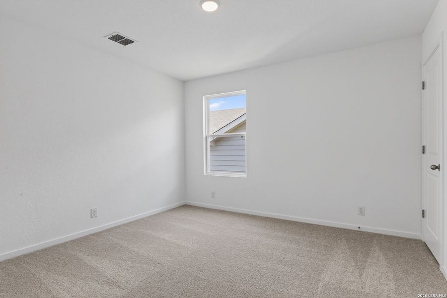 Spacious, unfurnished interior of a new home in Hennersby Hollow, San Antonio (Image 24).