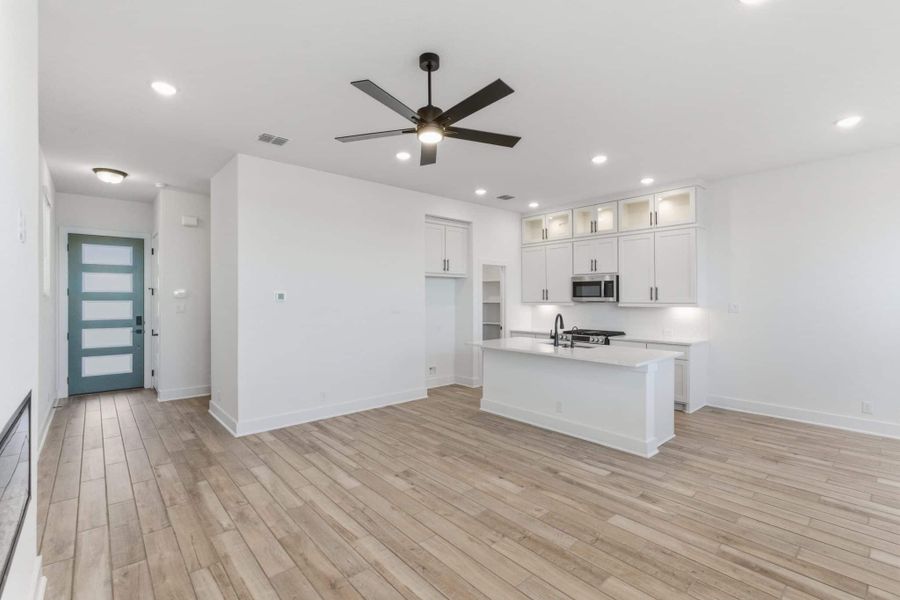 Spacious, unfurnished interior of a new home in Centero at Stone Oak, San Antonio (Image 23).