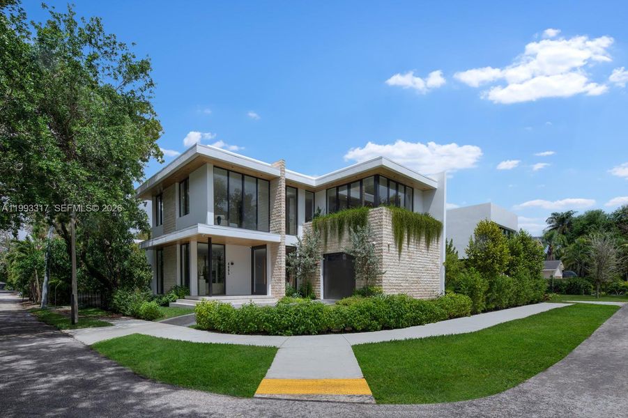 Front exterior of a new home in , Miami, FL, highlighting curb appeal (Image 25).