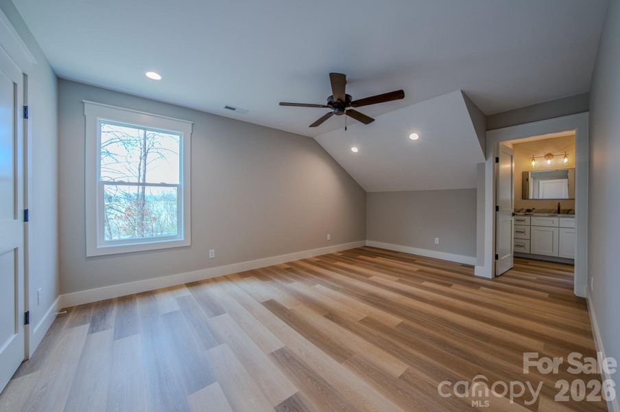 Upstairs bedroom 1 with Jack and Jill bathroom with separate sink.
