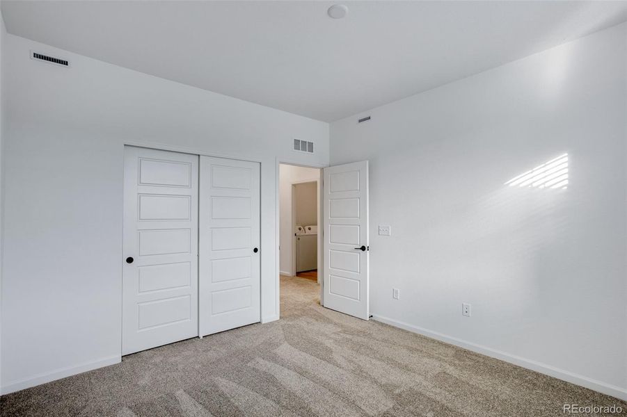 Spacious, unfurnished interior of a new home in Westside Crossing Townhomes, Berthoud (Image 21).