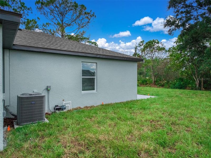 Exterior details and patio area of a home in , Sebring (Image 3).