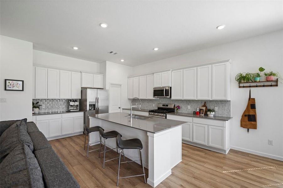 Don't miss the big walk-in pantry on your tour of the home.