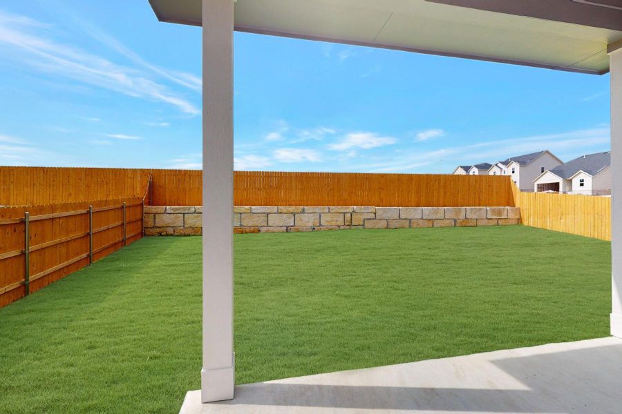 Exterior details and patio area of a home in Cascades at Onion Creek, Austin (Image 21).