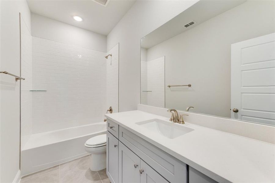 Furnished interior view inside a new home in Villages of Creekwood, Frisco (Image 11).