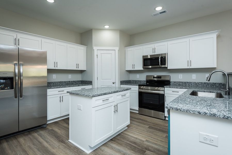 Representative furnished interior of a home built from the Brook C by Foundation Home Builders LLC in Pallini Place, Ossipee (Image 4).