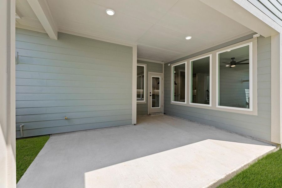 Exterior details and patio area of a home in The Retreat at Harvest, Argyle (Image 4).