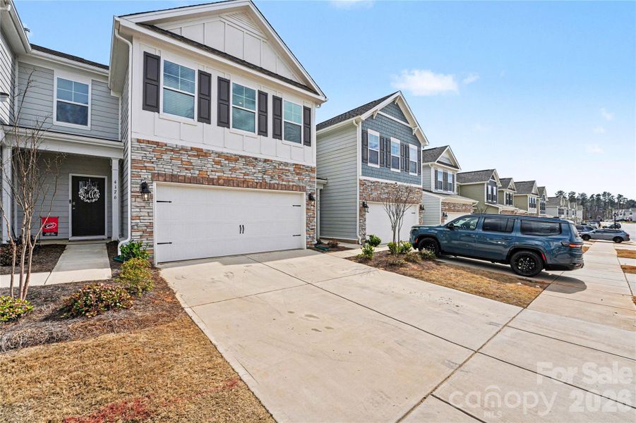 Front exterior of a new home in , Sherrills Ford, NC, highlighting curb appeal (Image 20).