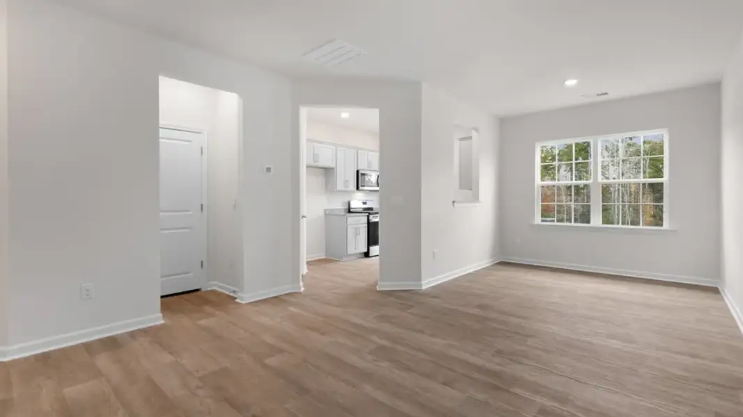 Spacious, unfurnished interior of a new home in The Townes at Galvins Ridge, Sanford (Image 12).