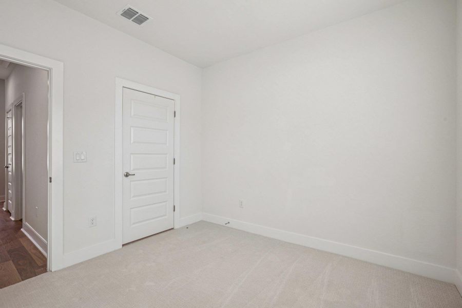 Spacious, unfurnished interior of a new home in Koenig Townhomes, Austin (Image 21).