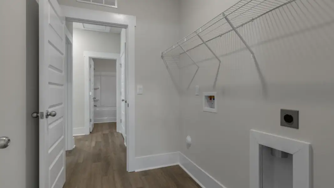 Spacious, unfurnished interior of a new home in The Retreat at Indigo Preserve Townhomes, Leland (Image 30).