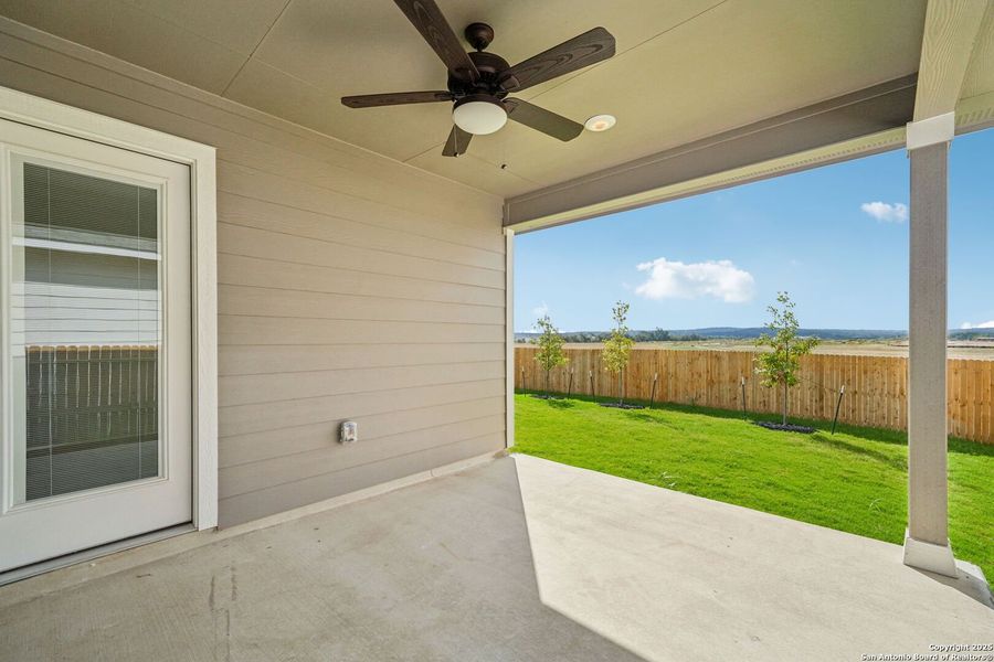 Exterior details and patio area of a home in Estancia Ranch - Premier Series, San Antonio (Image 19). Exterior details and patio area of a home in Estancia Ranch - Premier Series, San Antonio (Image 19).
