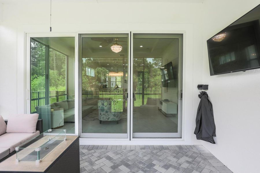 Furnished interior view inside a new home in PGA Village Verano, Port St. Lucie (Image 3).