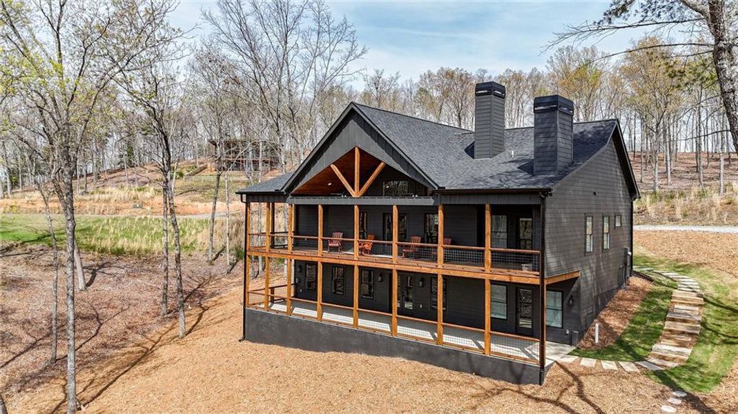 Front exterior of a new home in , Morganton, GA, highlighting curb appeal (Image 2). Front exterior of a new home in , Morganton, GA, highlighting curb appeal (Image 2).