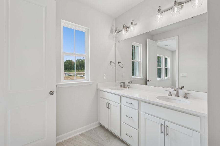 Representative furnished interior of a home built from the Nola by Tri Pointe Homes in Holding Village, Wake Forest (Image 7).