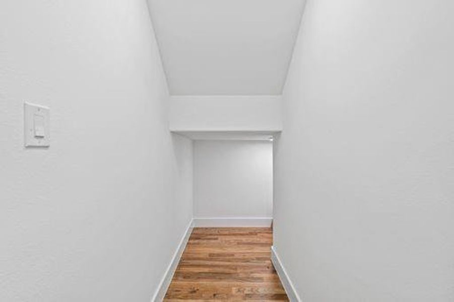 Walk in closet featuring light wood-type flooring