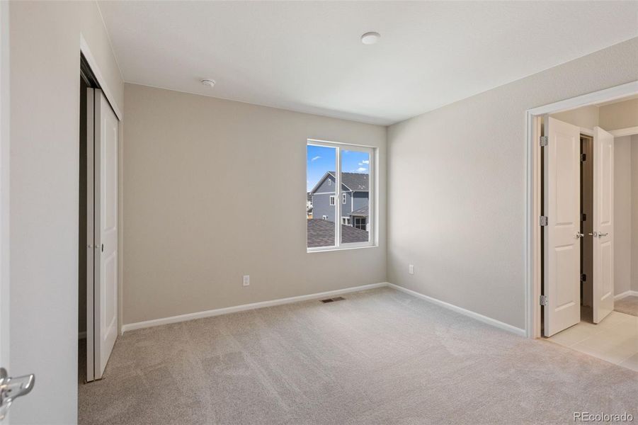 Spacious, unfurnished interior of a new home in Woodrose at Painted Prairie, Aurora (Image 17).