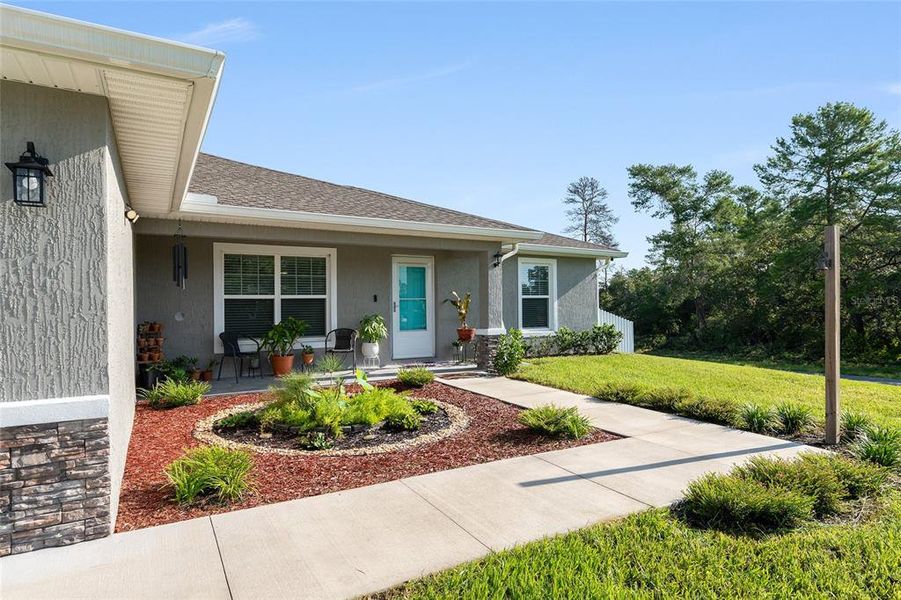 Front exterior of a new home in , Ocala, FL, highlighting curb appeal (Image 2).