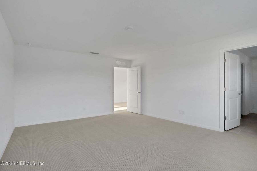 Spacious, unfurnished interior of a new home in Cordova Palms, St. Augustine (Image 33).