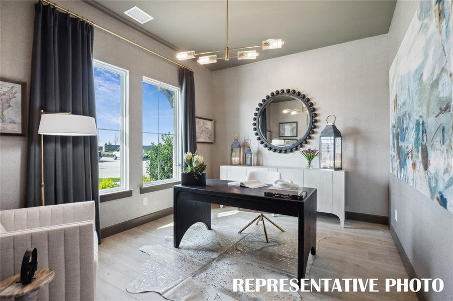 Our homes in Painted Tree Woodlands West feature fantastic home offices designed for work or play!  REPRESENTATIVE PHOTO OF MODEL HOME