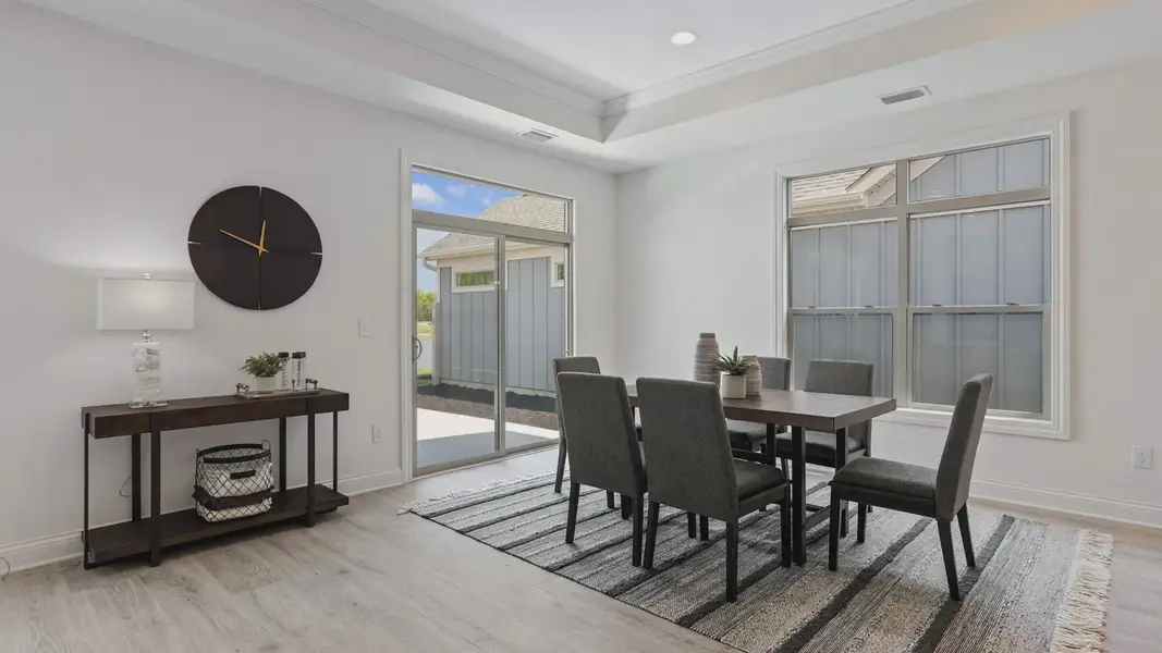 Representative furnished interior of a home built from the Salerno by Epcon Communities in Courtyards by Carrell, Ocean Isle Beach (Image 11).