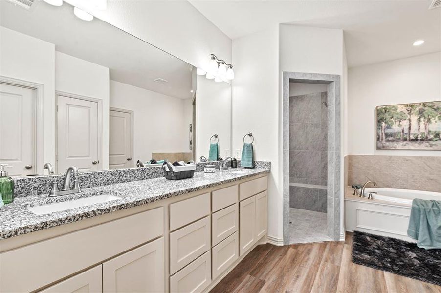 Primary bathroom in Doves Nest. Dual sinks and walk-in shower!