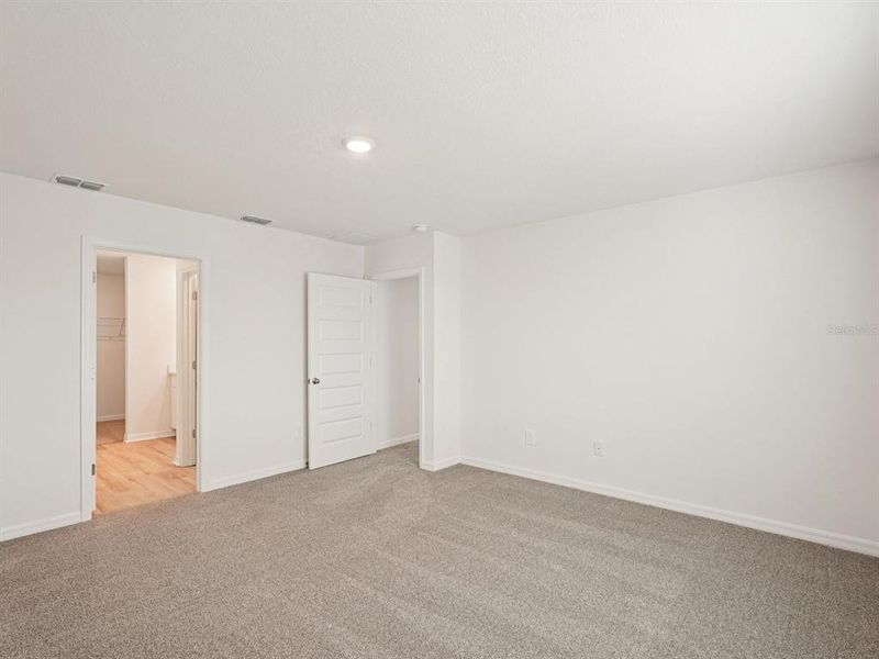 Spacious, unfurnished interior of a new home in Coasterra - Premier Series, Palmetto (Image 32).