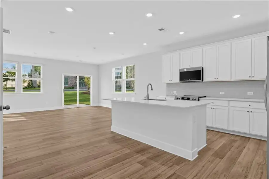 Furnished interior view inside a new home in Towns at Holly Springs, Holly Springs (Image 7).