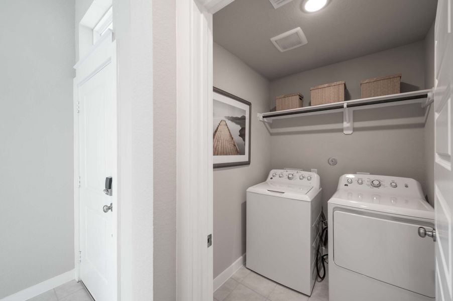 Furnished interior view inside a new home in The Ridge at Mason Woods, Cypress (Image 31). Furnished interior view inside a new home in The Ridge at Mason Woods, Cypress (Image 31).