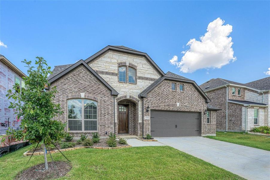 Front exterior of a new home in Creekview Meadows, Pilot Point, TX, highlighting curb appeal (Image 20).