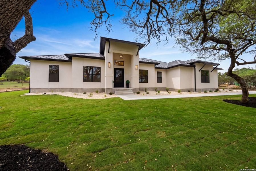 Exterior details and patio area of a home in , Boerne (Image 28).