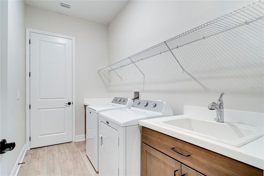 Furnished interior view inside a new home in , Kissimmee (Image 15).