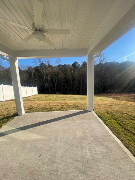 Exterior details and patio area of a home in Springwood Grove, Central (Image 2).