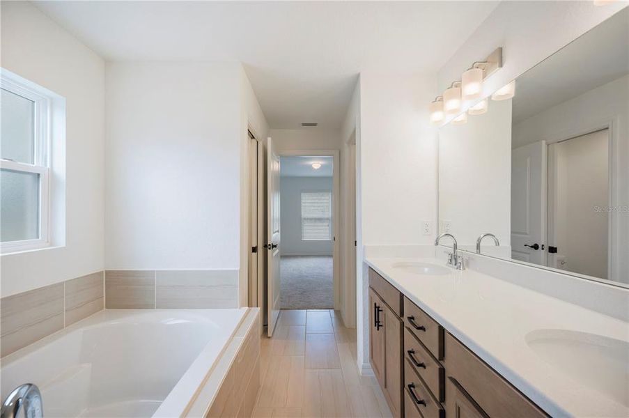 Furnished interior view inside a new home in , Frostproof (Image 8). Furnished interior view inside a new home in , Frostproof (Image 8).