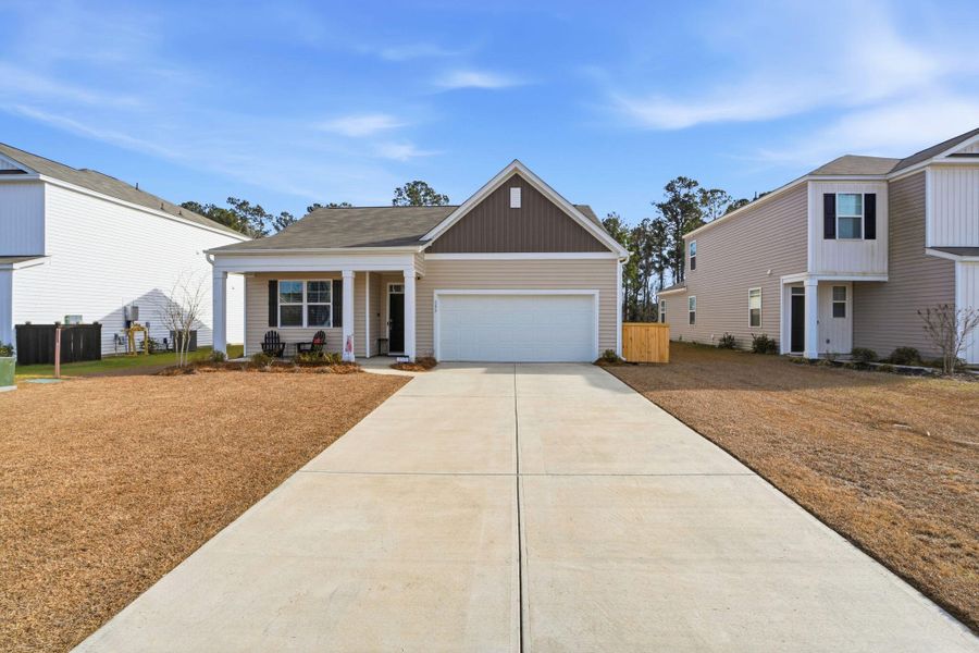 Front exterior of a new home in , Summerville, SC, highlighting curb appeal (Image 22).