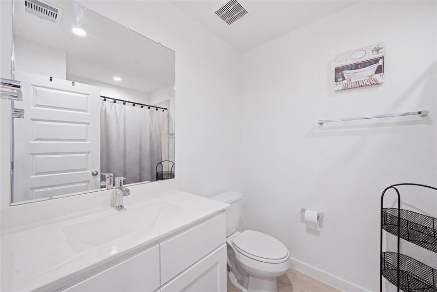 The hall bath is available for your guests and serves the secondary bedrooms.