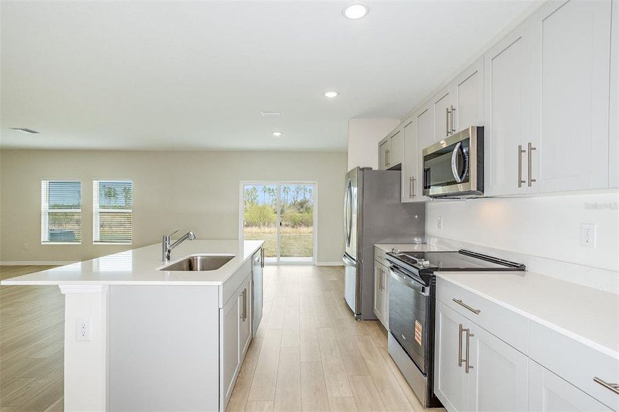 Furnished interior view inside a new home in Pasadena Ridge, Dade City (Image 5).