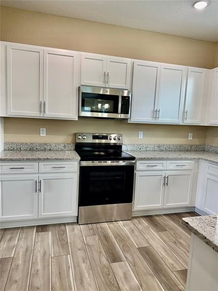 Furnished interior view inside a new home in , Weeki Wachee (Image 15).