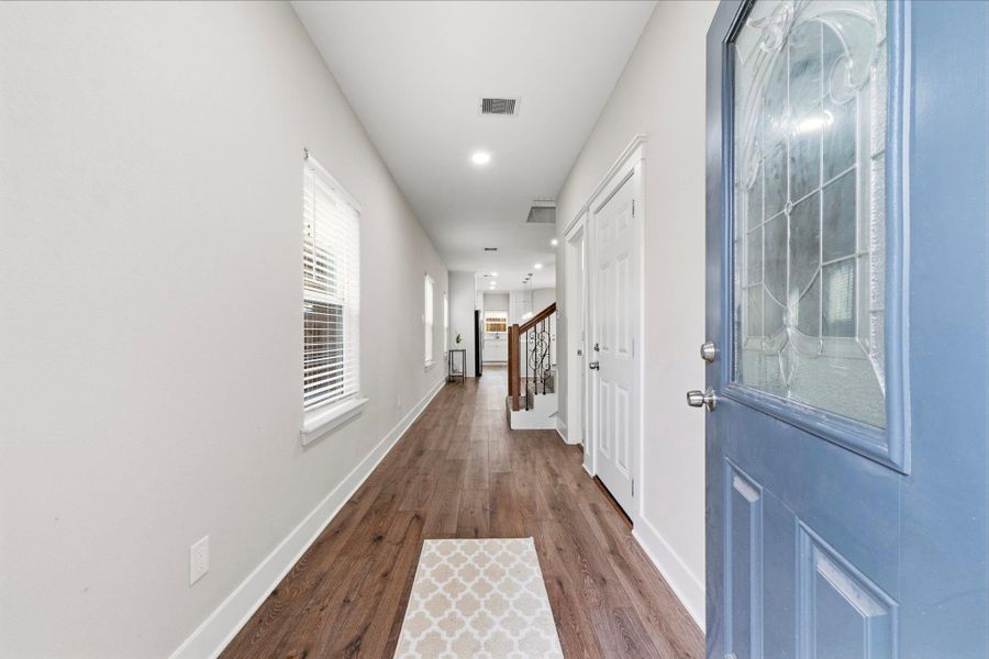 Main entrance features a custom detailed sophisticated aesthetic.