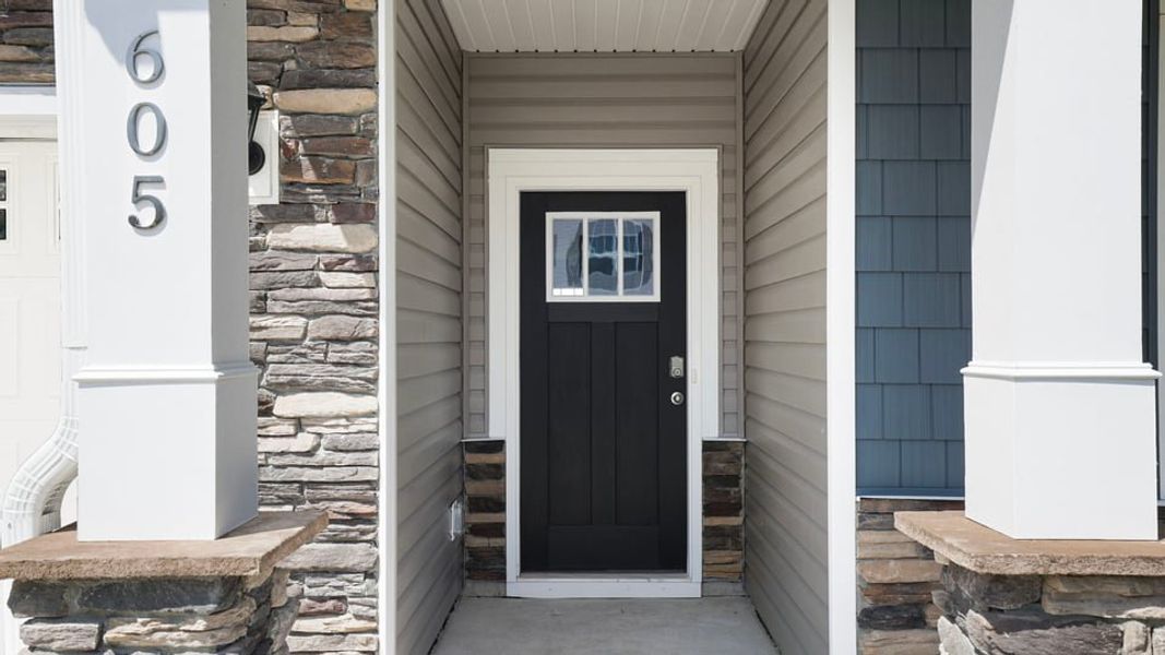 Exterior details and patio area of a home in Durbin Meadows Traditions, Fountain Inn (Image 2). Exterior details and patio area of a home in Durbin Meadows Traditions, Fountain Inn (Image 2).