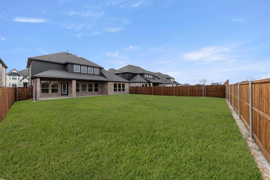 Exterior details and patio area of a home in Sutton Fields, Celina (Image 21).
