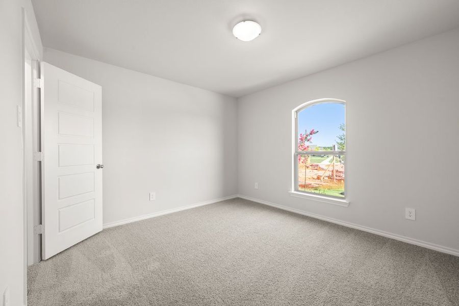 Front exterior of a new home in Stone Eagle, Azle, TX, highlighting curb appeal (Image 11). Front exterior of a new home in Stone Eagle, Azle, TX, highlighting curb appeal (Image 11).