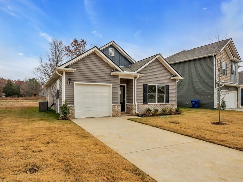 Front exterior of a new home in Cantigny Park, Clarksville, TN, highlighting curb appeal (Image 2).