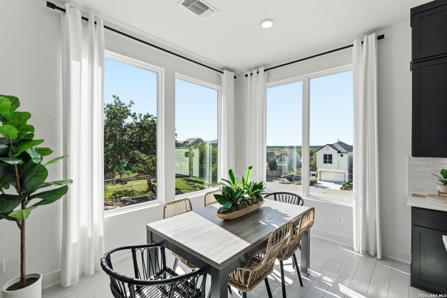 Furnished interior view inside a new home in Centero at Stone Oak, San Antonio (Image 8).
